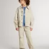 Giacca beige per bambino con spruzzi multicolori