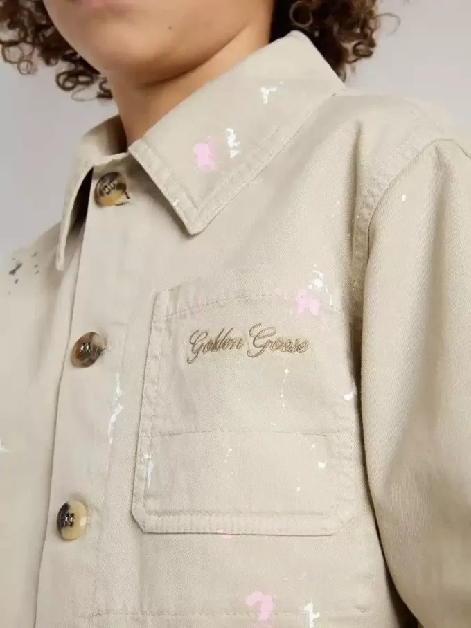 Giacca beige per bambino con spruzzi multicolori