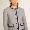 Giacca da donna in lana e seta grigia con rifiniture in pelle scamosciata nera