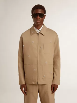 Giacca da uomo beige con ricami floreali e zip integrale Giacca da uomo beige con ricami floreali e zip integrale