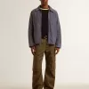Giacca da uomo blu in cotone denim con trattamento effetto consumato Giacca da uomo blu in cotone denim con trattamento effetto consumato