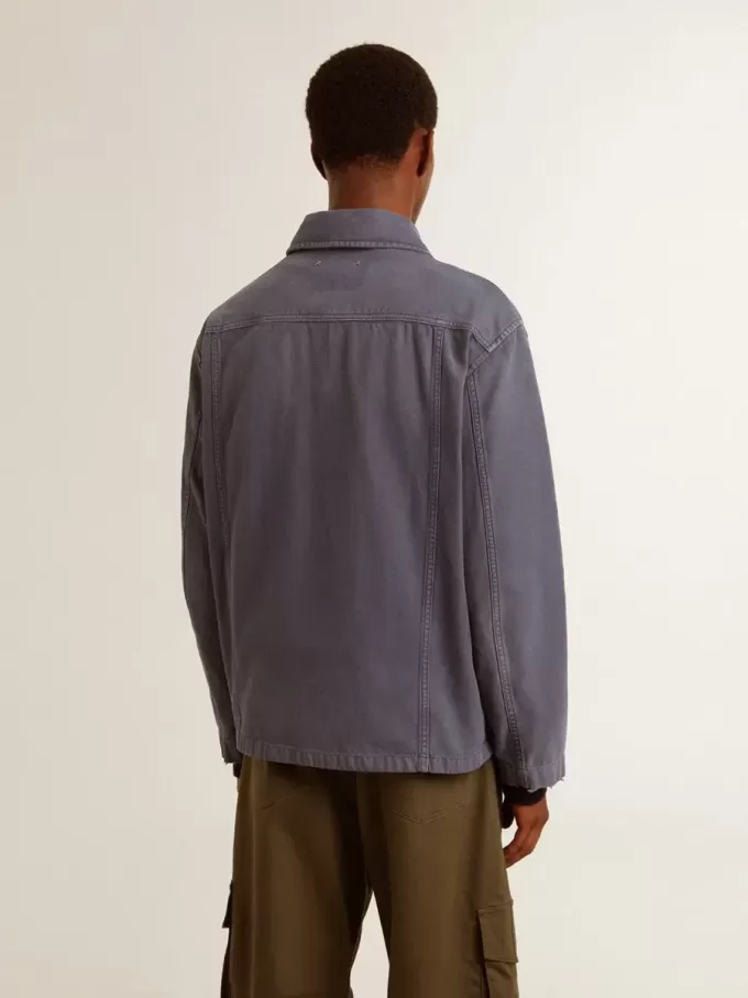Giacca da uomo blu in cotone denim con trattamento effetto consumato Giacca da uomo blu in cotone denim con trattamento effetto consumato