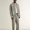 Giacca da uomo in denim grigio con borchie