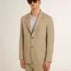 Giacca monopetto da uomo beige gessata con vestibilità oversize Giacca monopetto da uomo beige gessata con vestibilità oversize