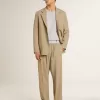 Giacca monopetto da uomo beige gessata con vestibilità oversize Giacca monopetto da uomo beige gessata con vestibilità oversize
