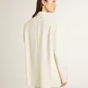 Giacca oversize monopetto bianca con effetto seta e ricami