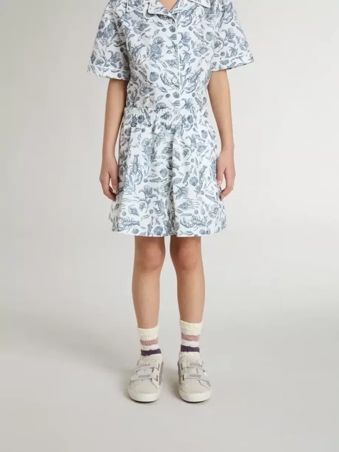 Gonna bianca da bambina con stampa blu Gonna bianca da bambina con stampa blu