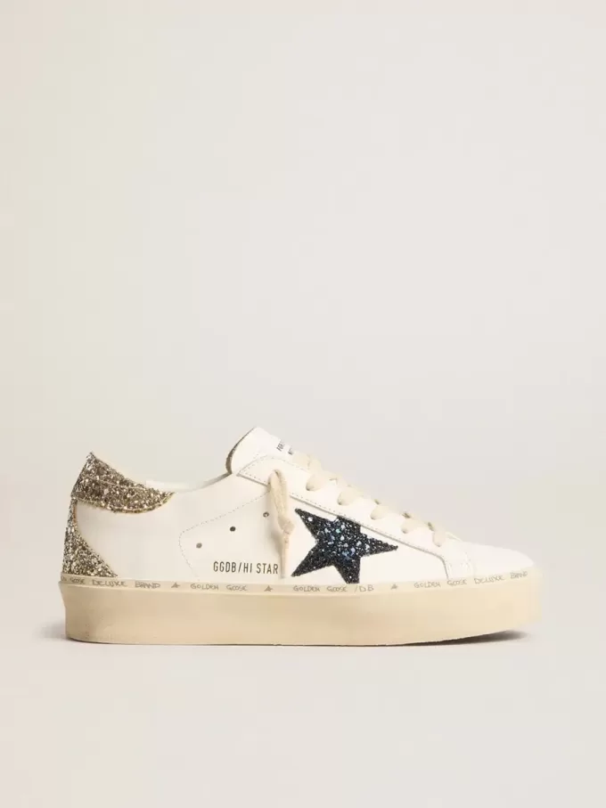 Hi Star da donna con stella blu glitterata e linguetta sul tallone con glitter platino Hi Star da donna con stella blu glitterata e linguetta sul tallone con glitter platino