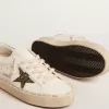 Hi Star LTD con stella glitterata nera e dorata e linguetta dorata sul tallone
