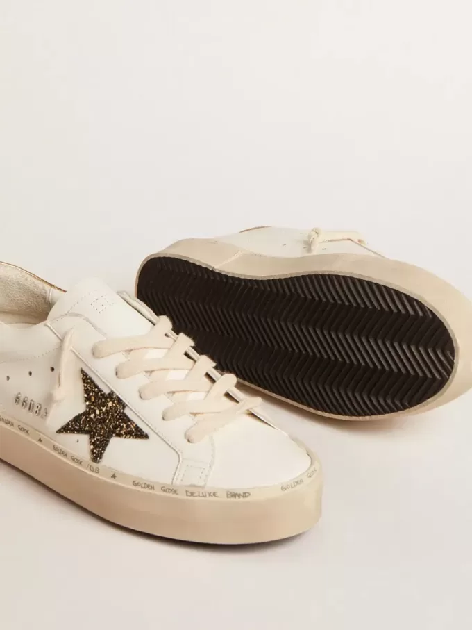 Hi Star LTD con stella glitterata nera e dorata e linguetta dorata sul tallone