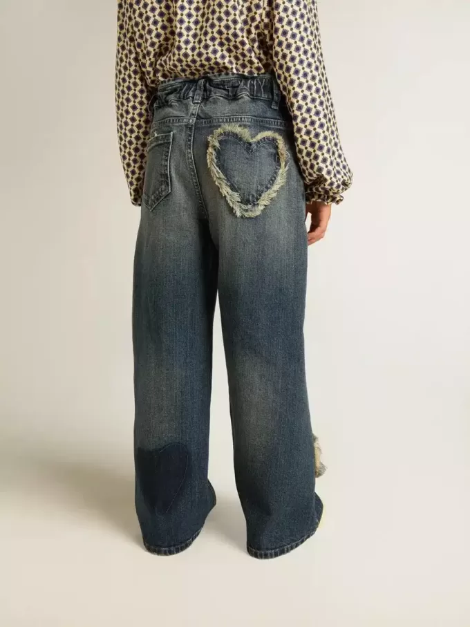Jeans a gamba larga da bambina in denim blu Jeans a gamba larga da bambina in denim blu