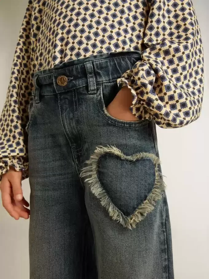 Jeans a gamba larga da bambina in denim blu Jeans a gamba larga da bambina in denim blu