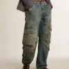 Jeans blu con finitura consumata
