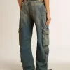 Jeans blu con finitura consumata