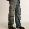 Jeans blu con finitura consumata