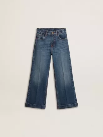 Jeans bootcut da bambina con lavaggio medio e ricami Jeans bootcut da bambina con lavaggio medio e ricami
