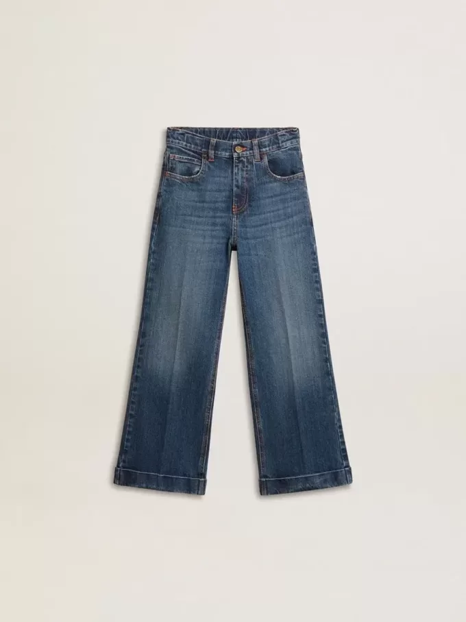 Jeans bootcut da bambina con lavaggio medio e ricami