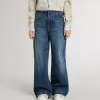 Jeans bootcut da bambina con lavaggio medio e ricami