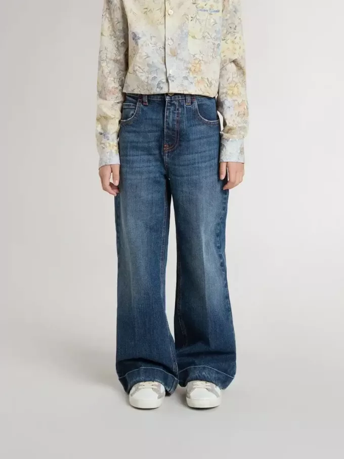 Jeans bootcut da bambina con lavaggio medio e ricami
