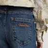 Jeans bootcut da bambina con lavaggio medio e ricami