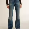 Jeans bootcut da donna con lavaggio vintage e dettagli metallici