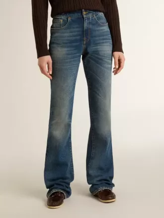 Jeans bootcut da donna con lavaggio vintage e dettagli metallici