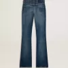 Jeans bootcut da donna con lavaggio vintage e dettagli metallici