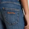 Jeans da bambino in denim con bordi grezzi e ricami