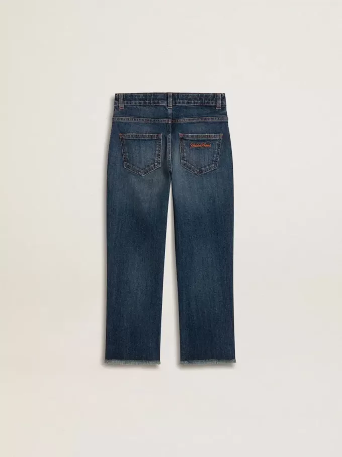 Jeans da bambino in denim con bordi grezzi e ricami