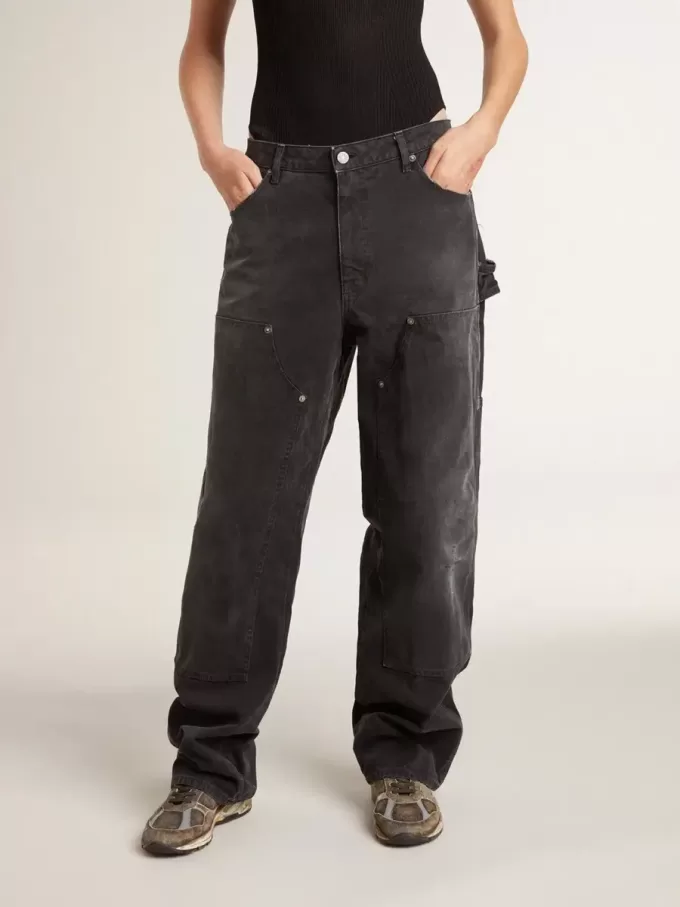 Jeans da donna in cotone nero effetto consumato con toppe frontali