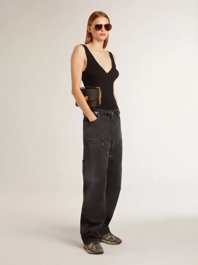 Jeans da donna in cotone nero effetto consumato con toppe frontali