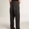 Jeans da donna in cotone nero effetto consumato con toppe frontali