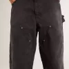 Jeans da donna in cotone nero effetto consumato con toppe frontali