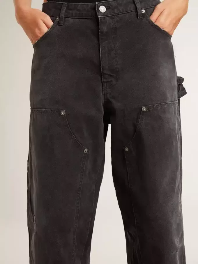 Jeans da donna in cotone nero effetto consumato con toppe frontali