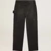 Jeans da donna in cotone nero effetto consumato con toppe frontali