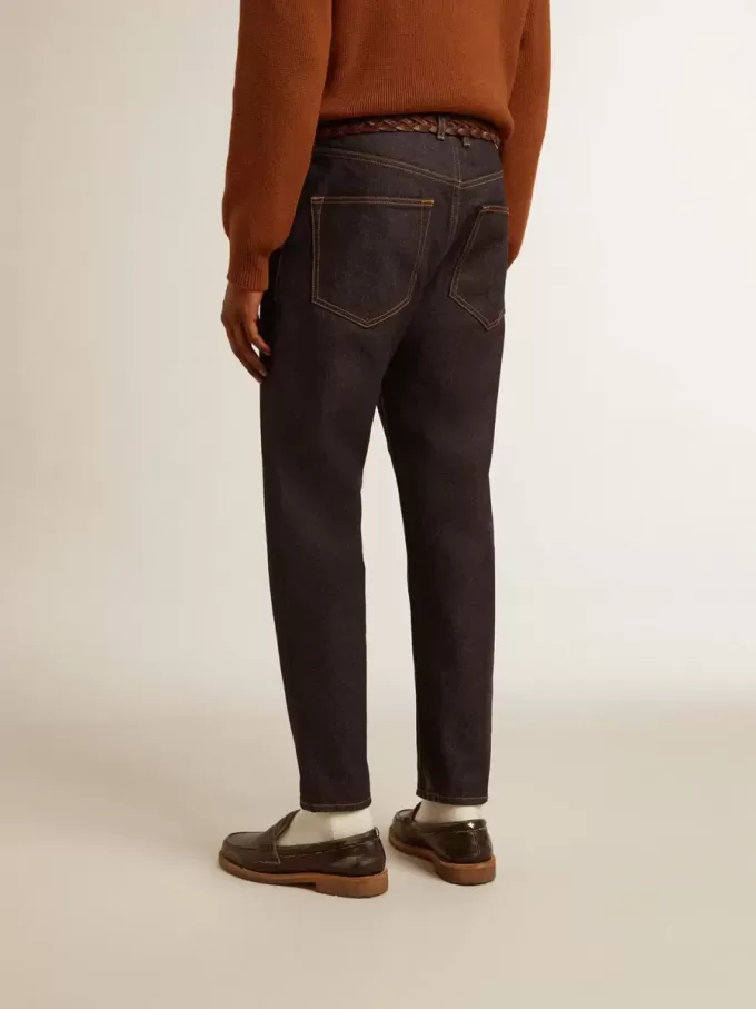 Jeans da uomo blu scuro in denim monolavaggio Jeans da uomo blu scuro in denim monolavaggio