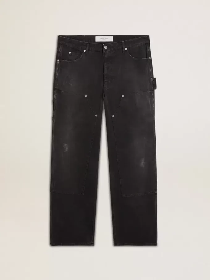 Jeans da uomo in cotone nero effetto consumato con toppe frontali