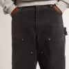 Jeans da uomo in cotone nero effetto consumato con toppe frontali