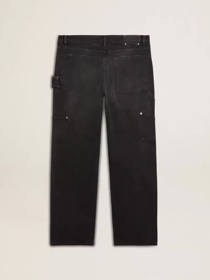 Jeans da uomo in cotone nero effetto consumato con toppe frontali