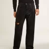 Jeans da uomo neri dal taglio morbido con cristalli all-over effetto sfumato Jeans da uomo neri dal taglio morbido con cristalli all-over effetto sfumato