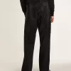 Jeans da uomo neri dal taglio morbido con cristalli all-over effetto sfumato Jeans da uomo neri dal taglio morbido con cristalli all-over effetto sfumato