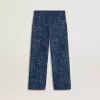 Jeans larghi da bambina con stampa e lavaggio medio Jeans larghi da bambina con stampa e lavaggio medio