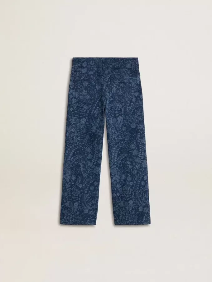 Jeans larghi da bambina con stampa e lavaggio medio Jeans larghi da bambina con stampa e lavaggio medio