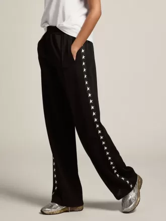 Joggers da donna neri con stelle bianche sui lati