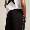 Joggers da donna neri con stelle bianche sui lati Joggers da donna neri con stelle bianche sui lati