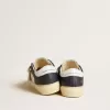 Junior May in pelle bianca e blu con stella e linguetta sul tallone in pelle
