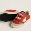 Junior Old School in nappa arancione con stella bianca e linguetta sul tallone in pelle color crema Junior Old School in nappa arancione con stella bianca e linguetta sul tallone in pelle color crema