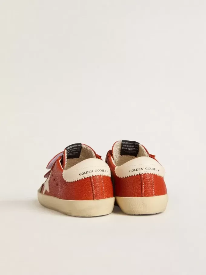 Junior Old School in nappa arancione con stella bianca e linguetta sul tallone in pelle color crema Junior Old School in nappa arancione con stella bianca e linguetta sul tallone in pelle color crema