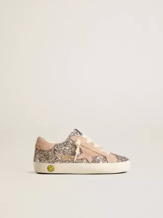 Junior Super-Star glitterata con stella in pelle scamosciata e linguetta sul tallone