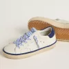 Junior Super-Star in pelle bianca con tallone in camoscio blu Junior Super-Star in pelle bianca con tallone in camoscio blu